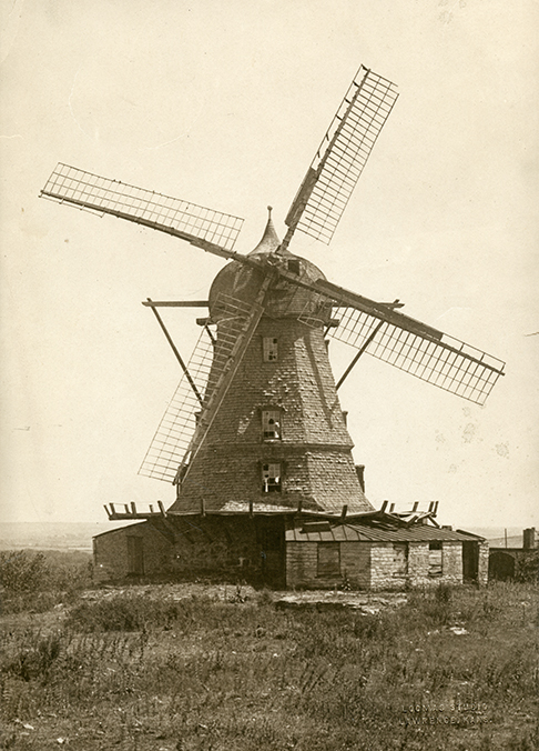 The 80-foot Dutch-style windmill built by Wilder & Palm at 9th and Emery in Lawrence, Kansas, standing from 1864 until 1905.